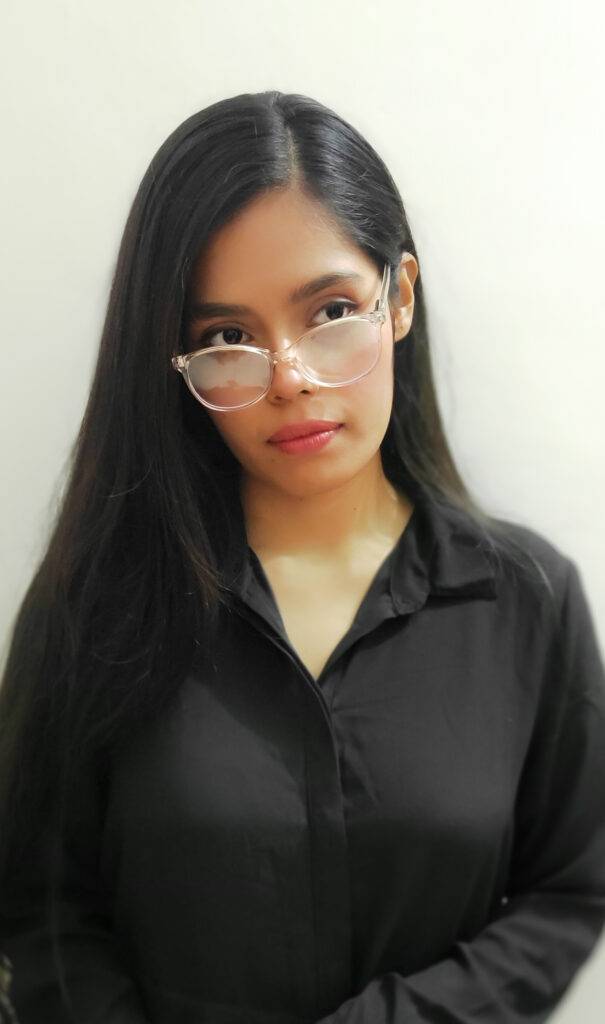 Mousumi Karim in a black dress